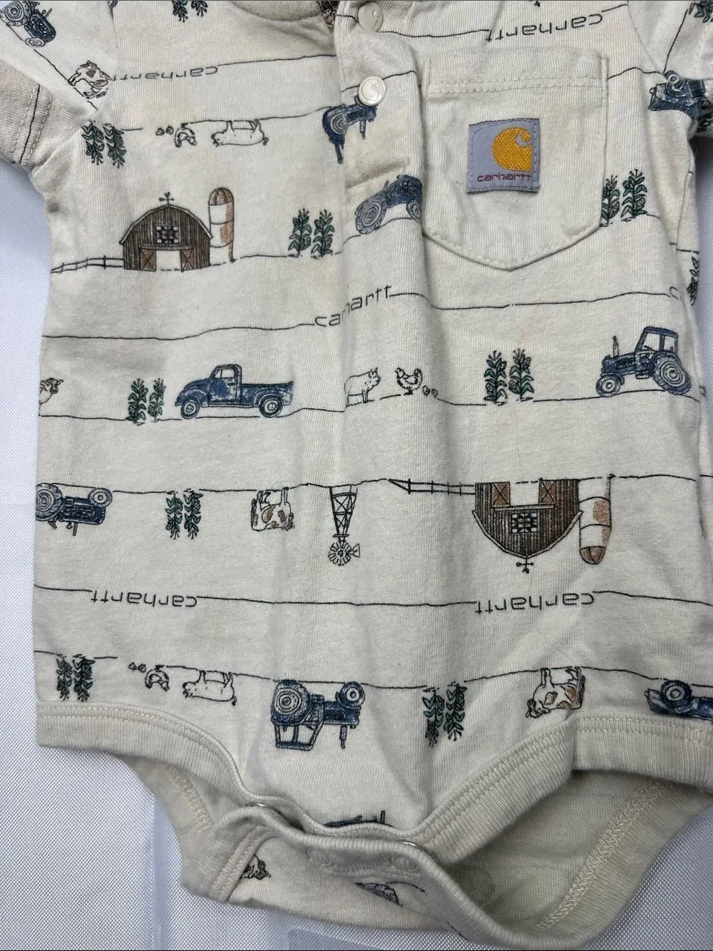 Carhartt tan farm print one piece Henley pocket tee. Size 6 months